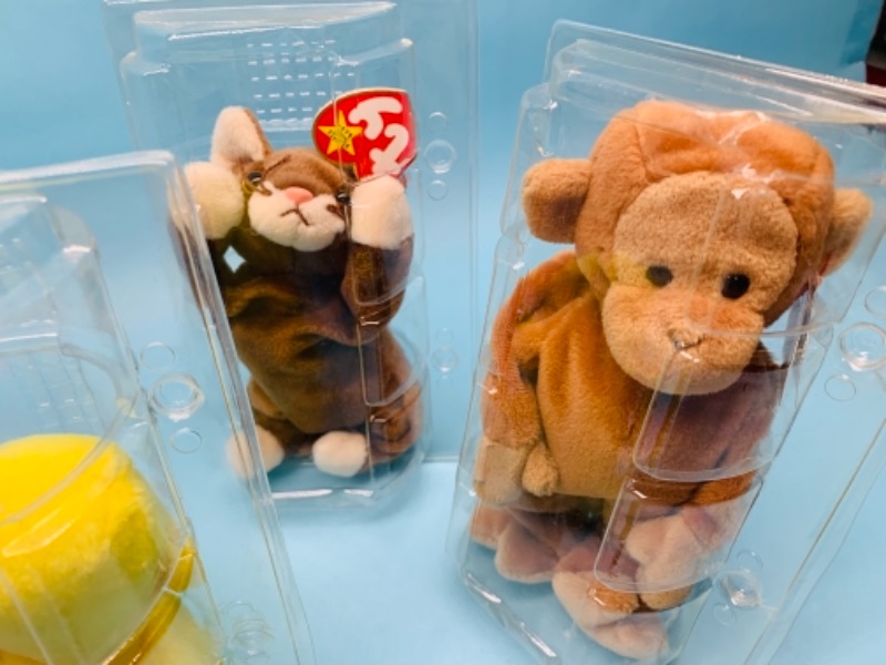 Photo 2 of 766952…beanie babies ty plushies in plastic displays 