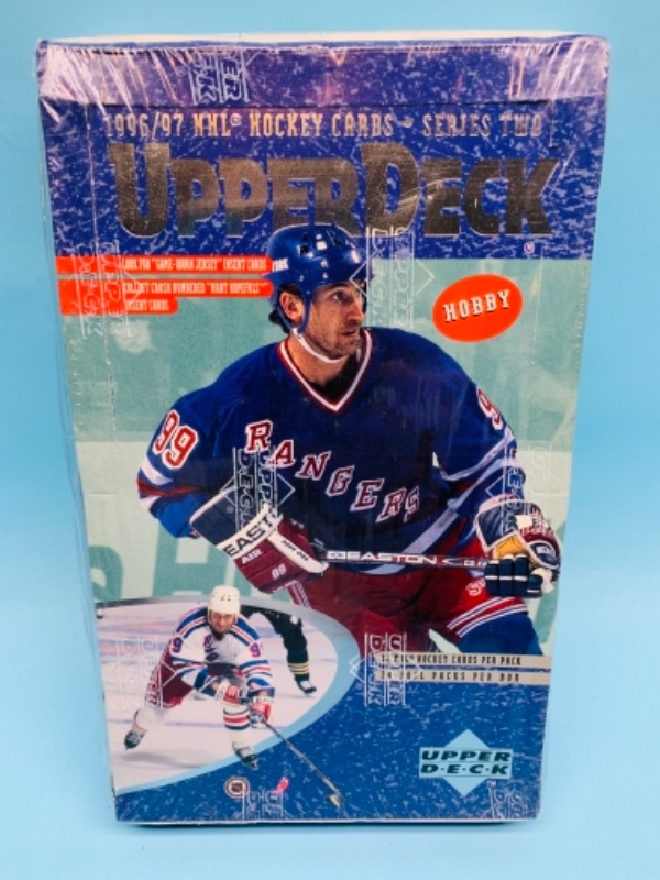 Photo 2 of 766974…sealed 96-97 upper deck hockey cards series 2  with game worn jersey cards