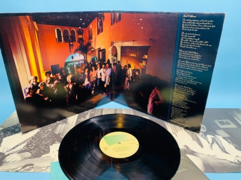 Photo 2 of 766980…1976 eagles Hotel California Vinyl great condition for age with poster insert in plastic sleeve