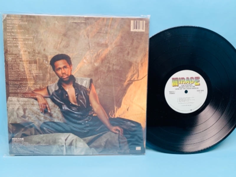 Photo 2 of 766984…1983 Nile Rodgers vinyl great condition for age in plastic sleeve 