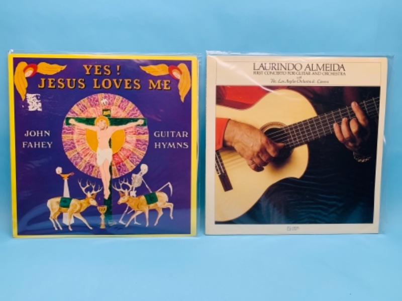 Photo 1 of 766992…2 guitar concert vinyl records great condition for age in plastic sleeves 