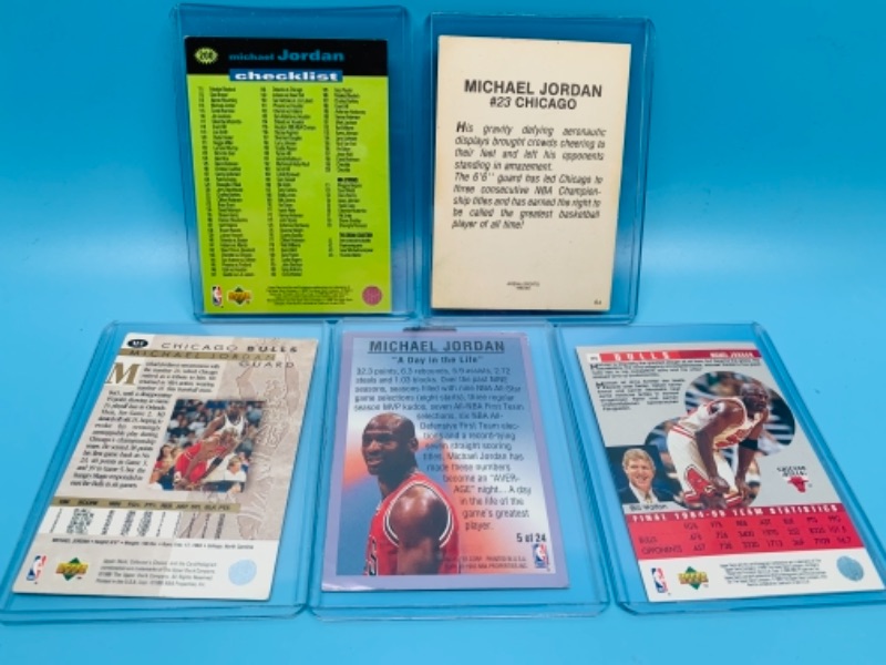 Photo 2 of 767019…5 Michael Jordan cards- all have minor bends, creases, or corner damage 