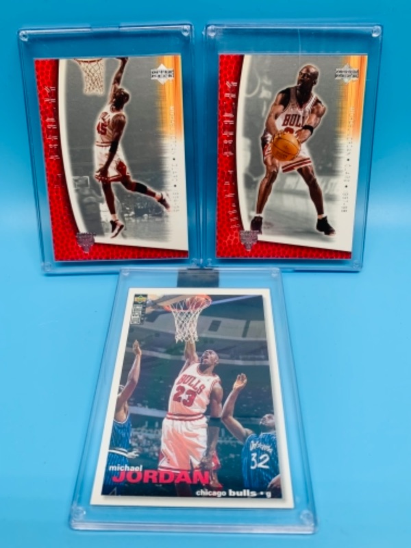 Photo 1 of 767025…3 Michael Jordan cards in hard plastic cases