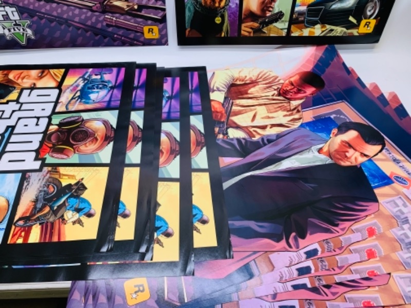 Photo 2 of 767031…25 grand theft auto double sided posters - all the same