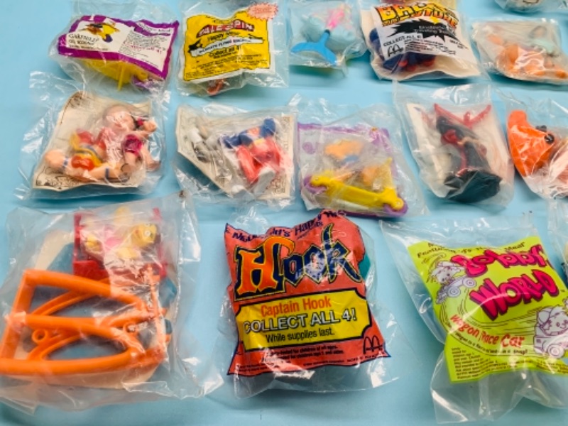Photo 2 of 767034…24 sealed vintage McDonald’s toys - Disney, looney toons, sonic and others 