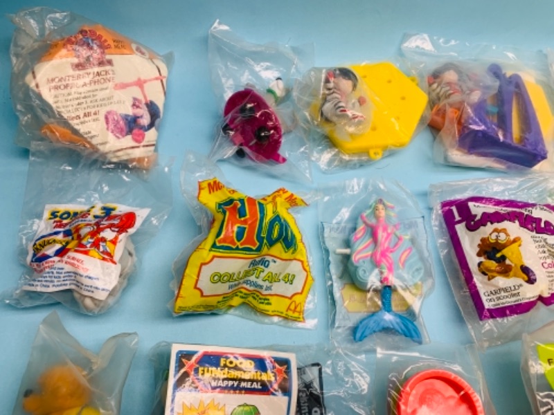 Photo 2 of 767035…34 sealed vintage McDonald’s happy meal toys in packages 