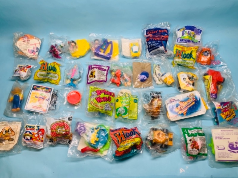 Photo 1 of 767035…34 sealed vintage McDonald’s happy meal toys in packages 