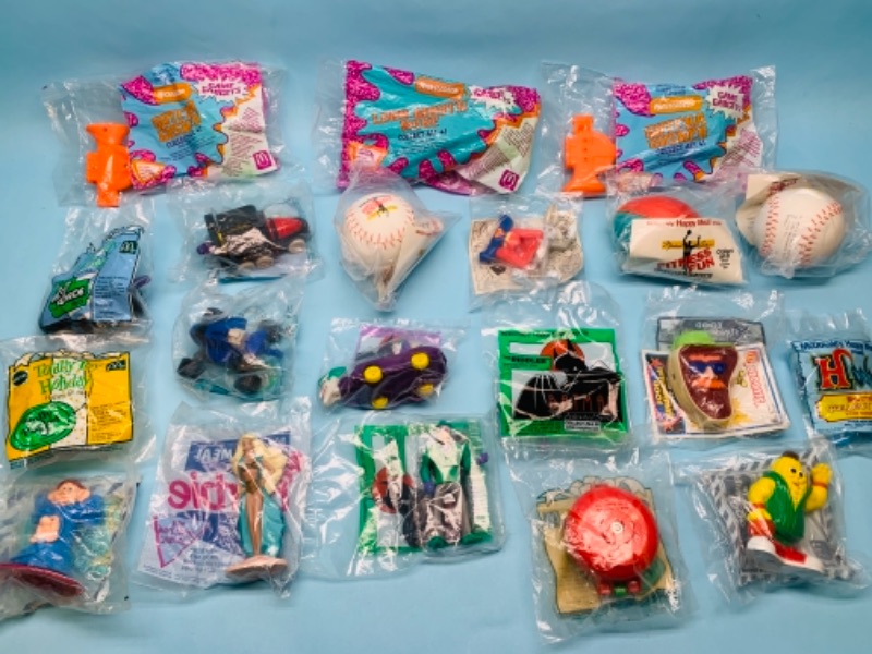 Photo 1 of 767039…20 sealed vintage McDonald’s toys Batman, Barbie, Nickelodeon, sports and others