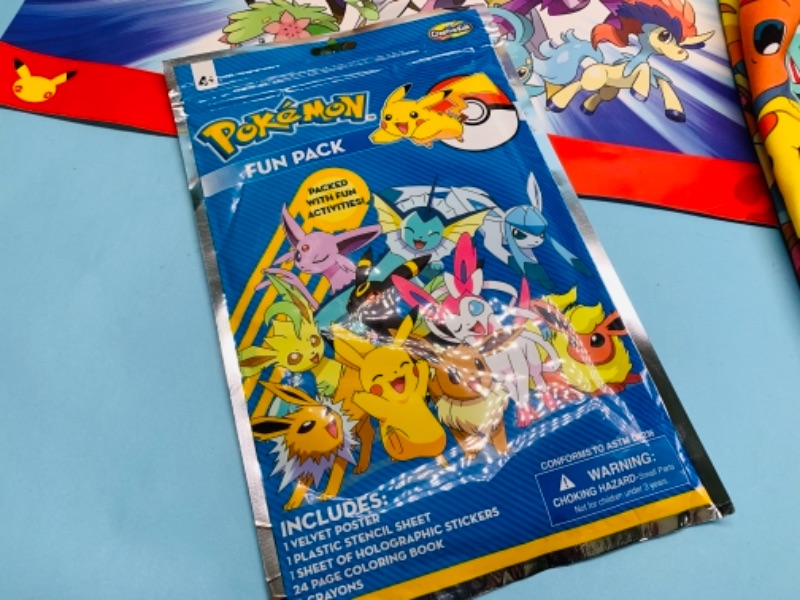 Photo 2 of 767049…Pokémon posters, pants, plushies and fun pack