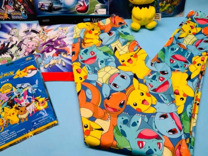 Photo 4 of 767049…Pokémon posters, pants, plushies and fun pack