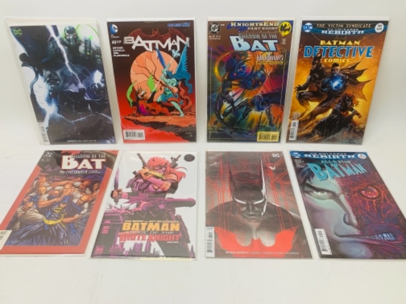 Photo 1 of 767087… eight Batman comics in plastic sleeves