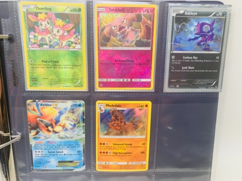 Photo 3 of 767097… 41 Pokémon 2012-2017 halo cards in binder 