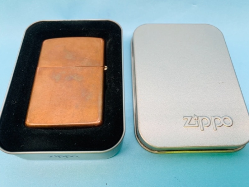 Photo 1 of 767116…vintage zippo lighter with removable copper case in tin box