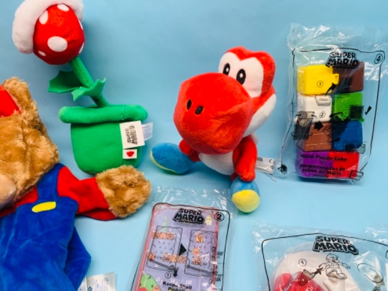 Photo 2 of 767165…sealed super Mario happy meal toys, plushies, and unstuffed build a bear 