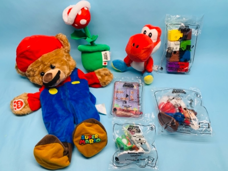 Photo 1 of 767165…sealed super Mario happy meal toys, plushies, and unstuffed build a bear 