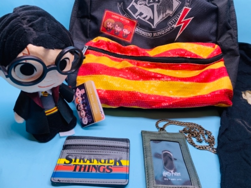 Photo 4 of 767167…twilight t-shirt, Harry Potter backpack, plushy, wallet, and stranger things wallet