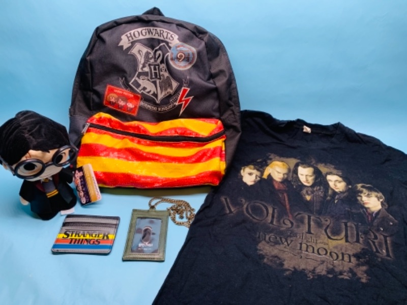 Photo 1 of 767167…twilight t-shirt, Harry Potter backpack, plushy, wallet, and stranger things wallet