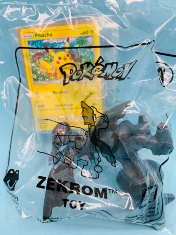 Photo 1 of 767182…sealed Pokémon pikachu halo card and figure McDonald’s happy meal toy 