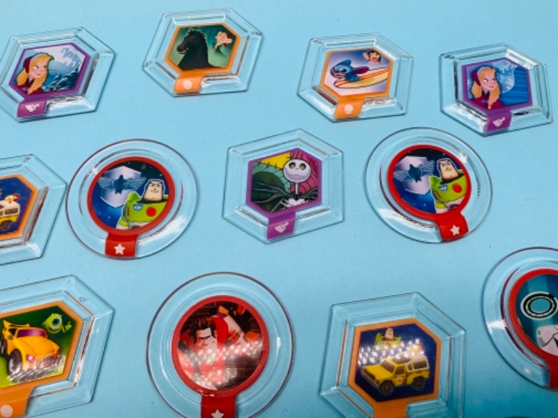 Photo 2 of 767218…28 Disney infinity power discs 