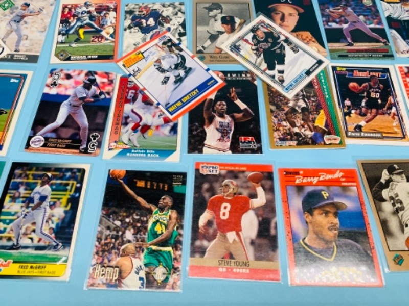 Photo 3 of 767227…75 mixed sports cards in plastic sleeves 