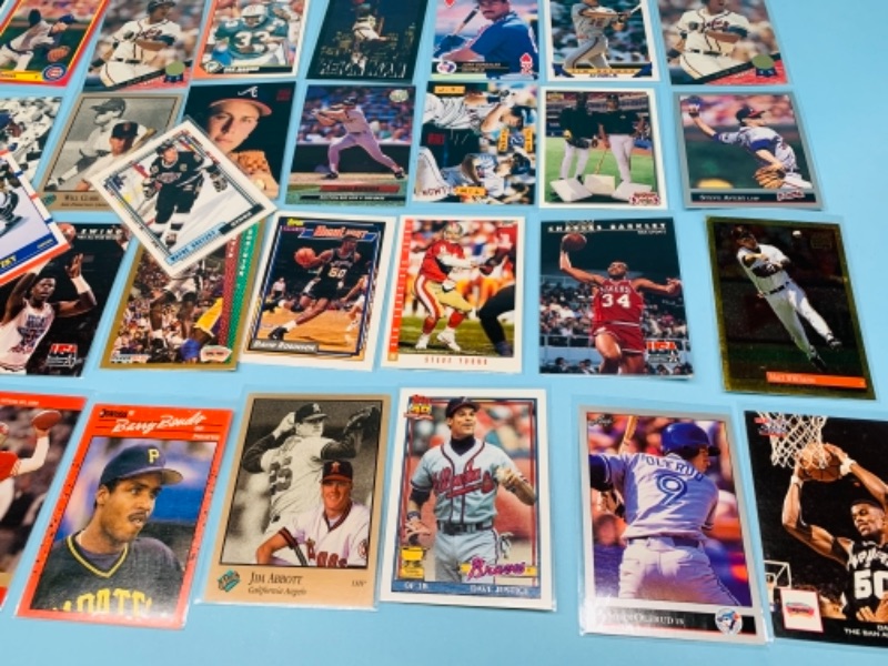 Photo 7 of 767227…75 mixed sports cards in plastic sleeves 