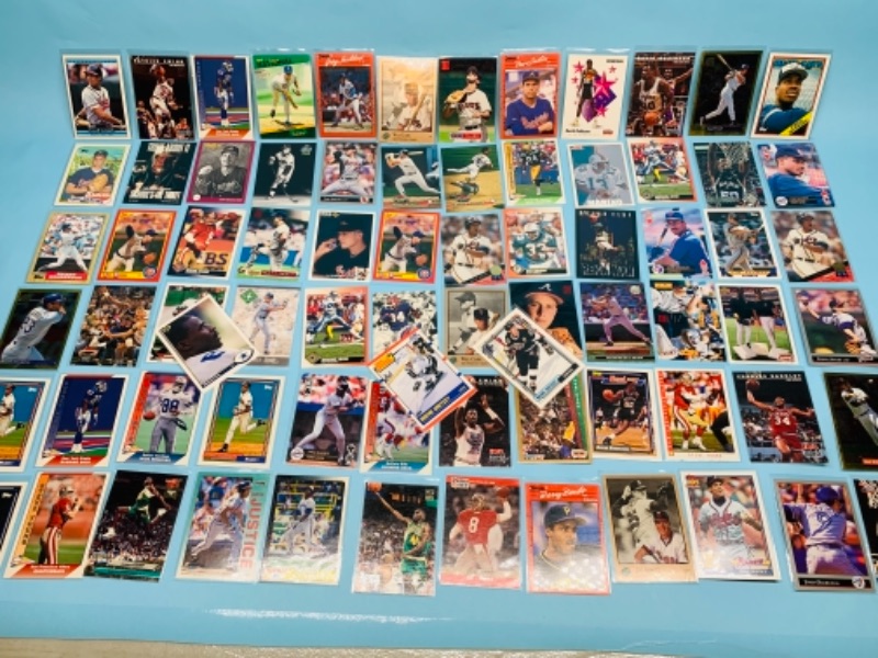 Photo 1 of 767227…75 mixed sports cards in plastic sleeves 