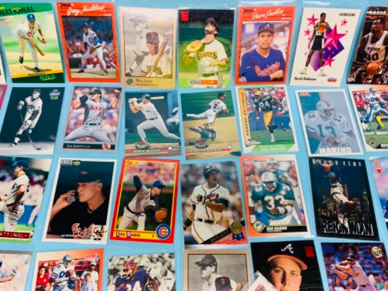 Photo 6 of 767227…75 mixed sports cards in plastic sleeves 