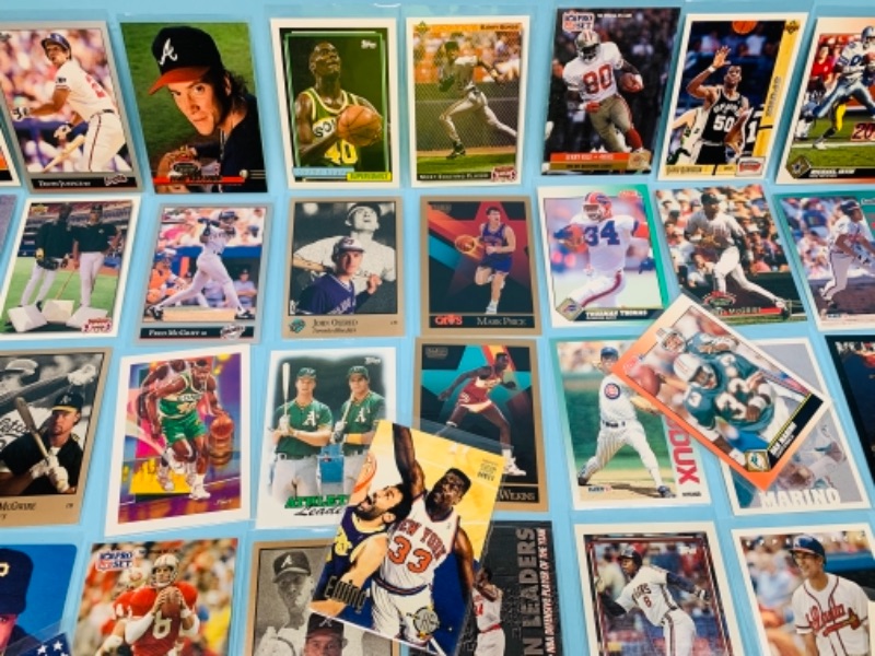 Photo 4 of 767228…75 mixed sports cards in plastic sleeves 