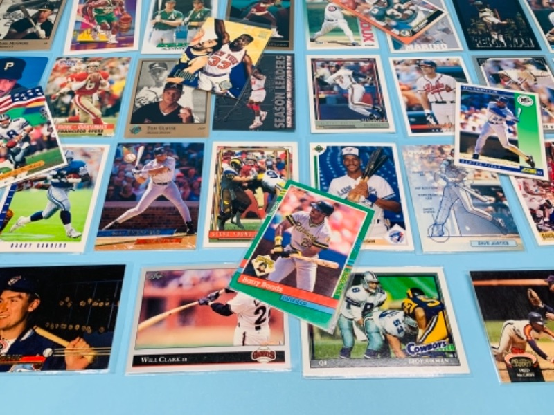 Photo 3 of 767228…75 mixed sports cards in plastic sleeves 