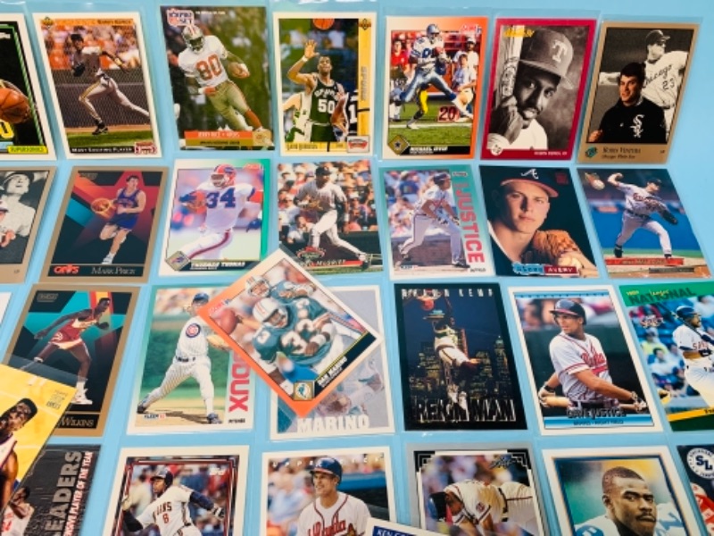 Photo 5 of 767228…75 mixed sports cards in plastic sleeves 