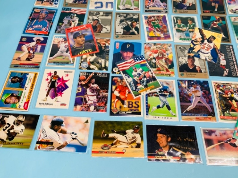 Photo 7 of 767228…75 mixed sports cards in plastic sleeves 