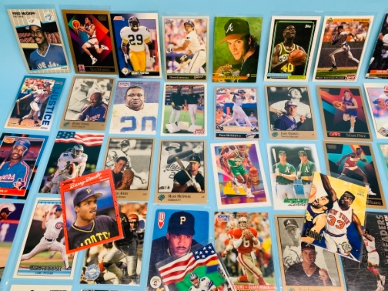 Photo 6 of 767228…75 mixed sports cards in plastic sleeves 