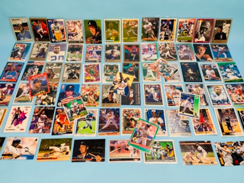 Photo 1 of 767228…75 mixed sports cards in plastic sleeves 