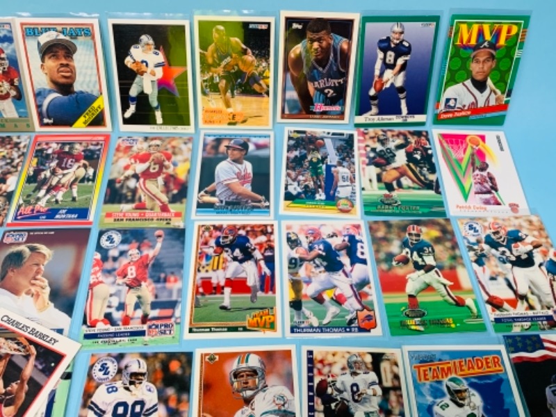 Photo 4 of 767231…75 mixed sports cards in plastic sleeves 