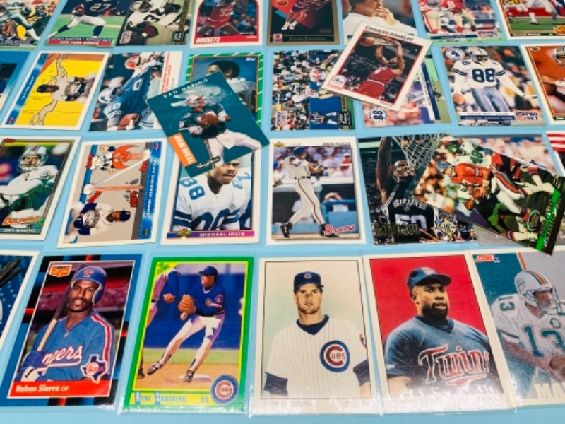 Photo 3 of 767231…75 mixed sports cards in plastic sleeves 