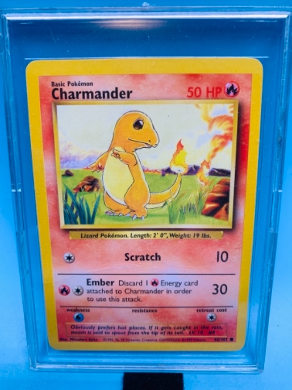 Photo 1 of 767263…Pokémon charmander 46/102 basic card in hard plastic case 