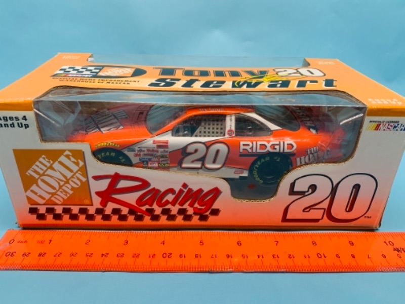 Photo 1 of 767272…the Home Depot racing 1:24 scale die cast car in original box 