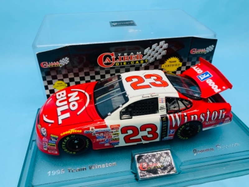 Photo 2 of 767291…8 inch nascar die cast stock car with coa in display- display has some scuffs