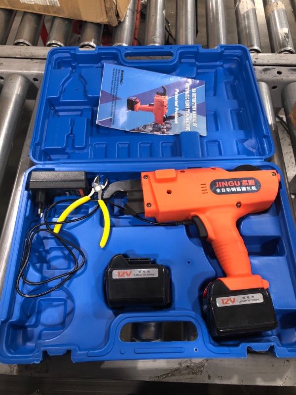 Photo 2 of Automatic Rebar Tying Machine Handheld Rebar Tier Tool Pliers Charger Batteries Tool Set Building Tying Machine Reinforcing Steel Strapping Kit Bar Rod BindingTool 30mm-60mm Tying Range
