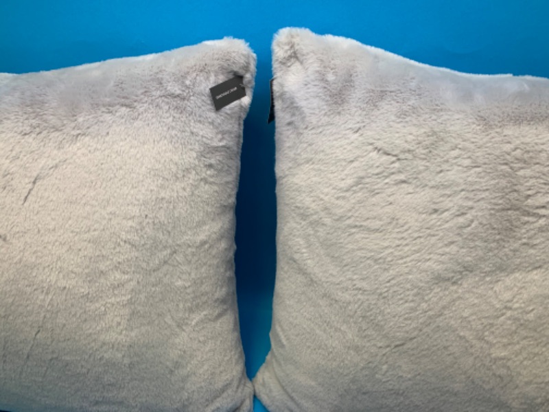 Photo 2 of 776157… 2 xxlarge fluffy toss pillows 24 x 24”