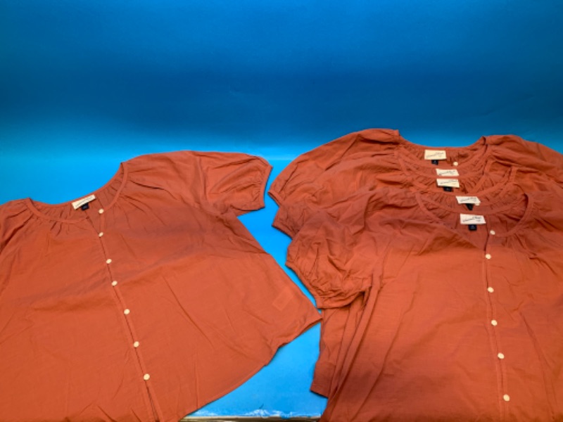 Photo 1 of 776486… 6 rust short sleeve ladies shirts size m