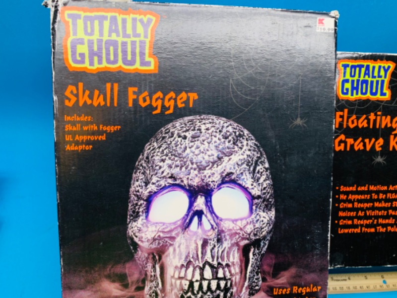 Photo 3 of 777243…2 Halloween items-skull digger and floating grave keeper-  worn boxes