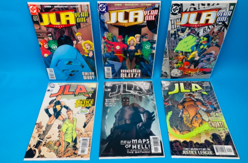 Photo 1 of 777401…6 JLA  comics in plastic sleeves 