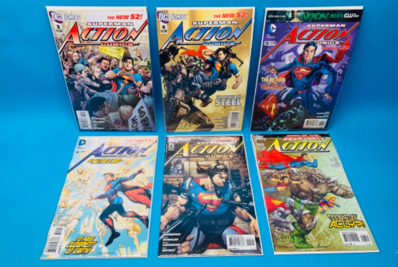 Photo 1 of 777415…6 action comics in plastic sleeves 