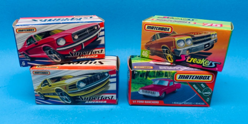 Photo 1 of 777437… 4 small matchbox die cast  cars in boxes 