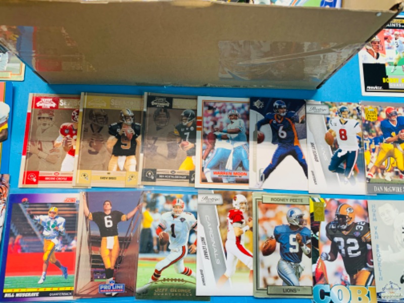 Photo 3 of 777455…700+ misc football trading cards in box