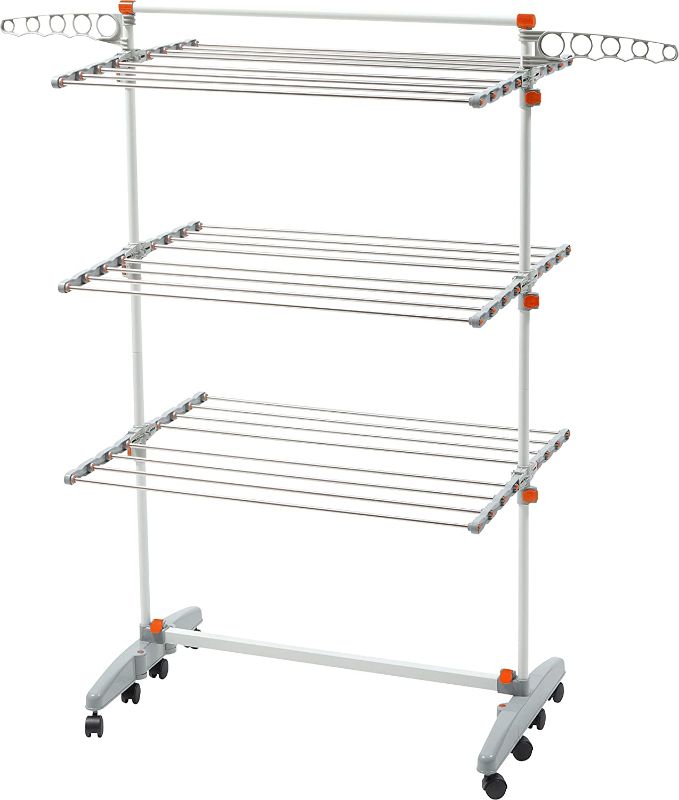 Photo 1 of TOMMMLY 3 LAYER DRYING RACK 30.7x25.2x66.9 INCHES INCLUDES 2 ABS CLOTH HOOL 2 TOP ABS CONNECTORS 2 TOP MIDDLE ABS 4 MIDDLE ABS 12 WIRE ET 2 ABS BAWE AND WHEELS 4 BAWE AND WHEELS 18 WIRE NET TUBE 12 SUPPORT TUBES 2 BASE CONNECTING TUBE 6 MIDDLE TUBE AND 20