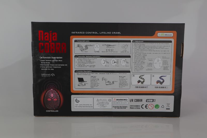 Photo 1 of NAJA COBRA SNAKE REALISTIC WITH SWINGING TAIL AND SYTHERING TONGUE USB CHARGEABLE CONTROLLER USES 3 LR44 BATTERIES NOT INCLUDED NEW IN BOX $20.99