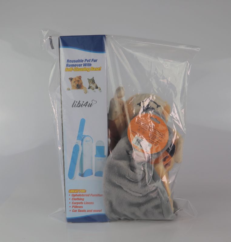 Photo 2 of SELF CLEANING LIBI4U PET LINT ROLLER AND 2 CRITTERS WITH SQUEAKS IN HEAD DONKEY AND DOG NEW $34.15