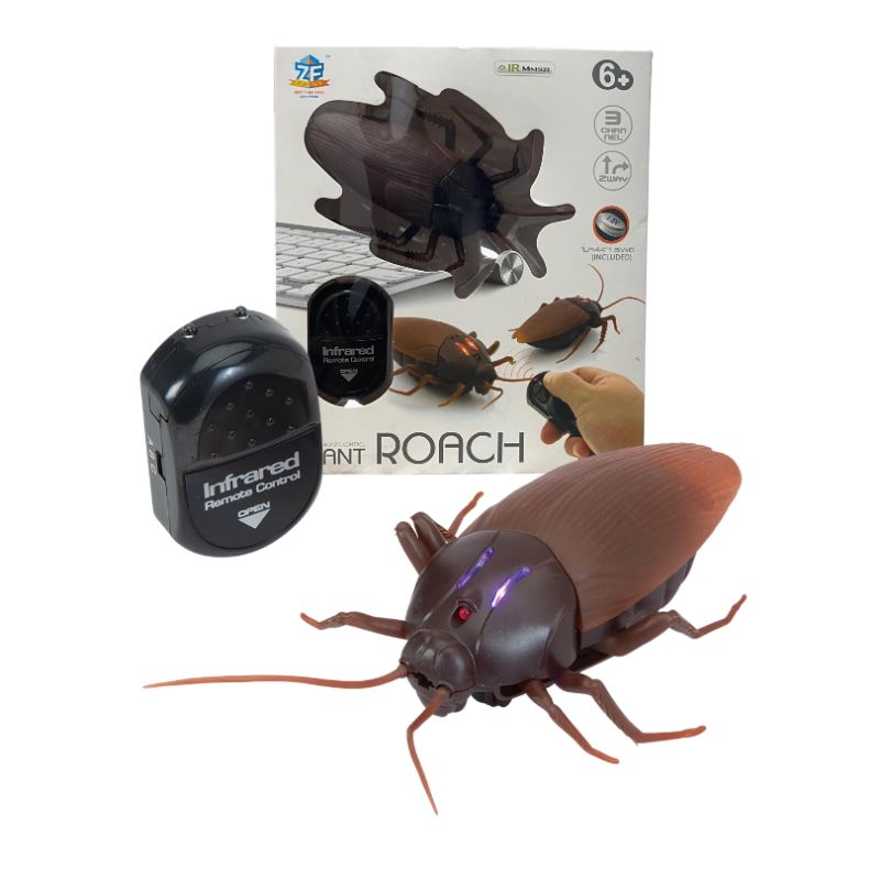 Photo 1 of GIANT INFRARED ROACH REMOTE CONTROL TOY USES 6 LR44 BATTERIES 3 FREQUENCIES ON REMOTE A B AND C PLAM SIZE NEW $19.99